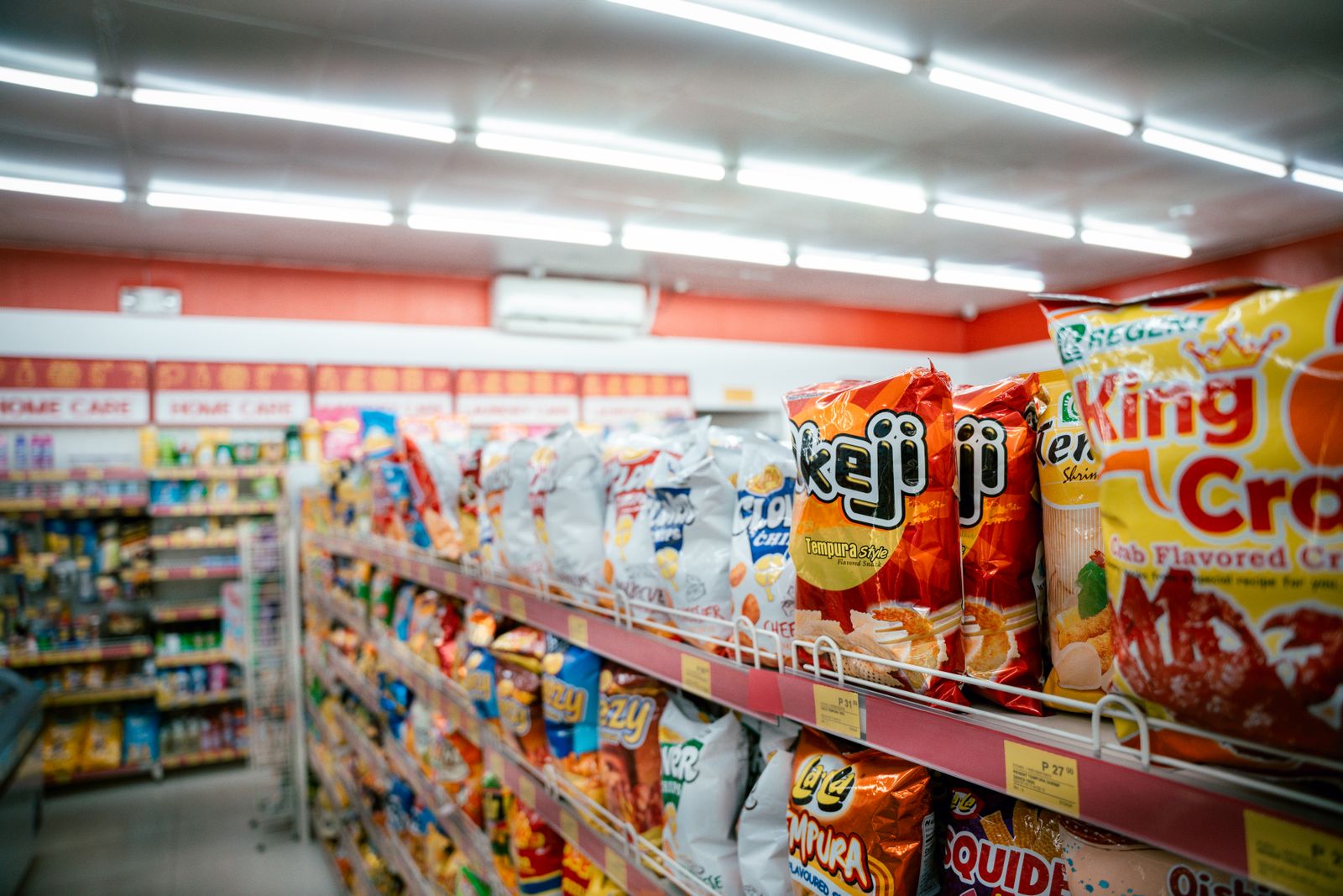 Retail grocery shelves representing modern and traditional trade in Saudi Arabia